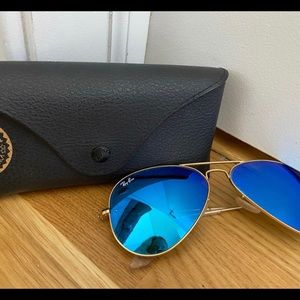 Blue raybans with gold rim. Fairly new and in great condition